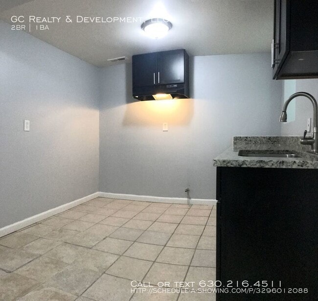 Building Photo - 6707 S Langley Ave
