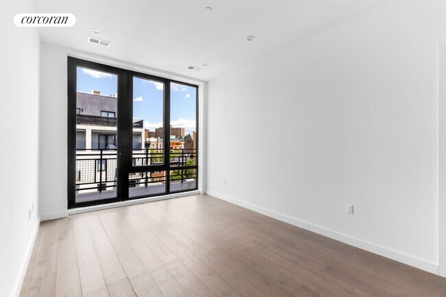 Foto del edificio - 407 E 117th St