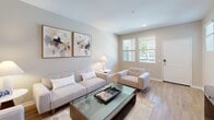 This well-appointed 2-bedroom, 2-bathroom single-story home in Moreno Valley, California offers a functional and modern living experience. The open-concept layout seamlessly connects the kitchen and living area, creating a welcoming and cohesive space throughout.

The kitchen is a standout feature, outfitted with rich, dark-toned cabinetry, stainless steel appliances including a gas range, microwave, refrigerator, and dishwasher, as well as crisp white countertops and light wood-style flooring. A butcher block island with seating adds a practical and stylish centerpiece to the space.

The living room is bright and airy, benefiting from natural light through multiple windows. Light hardwood flooring extends throughout the main areas, lending warmth and continuity to the home.

The primary bedroom is generously sized, featuring plush carpet, dual windows that invite natural light, and access to a dedicated closet. The second bedroom is equally comfortable, with soft carpet, a closet, and easy access to the hallway and bathrooms.

Both bathrooms are finished with light wood-style flooring, clean neutral tones, vanities with ample storage, and tub-shower combinations. A hallway connects the bedrooms and bathrooms, providing a practical and organized flow throughout the home.
