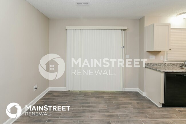 Foto del edificio - 9409 Dogwood Ridge Dr