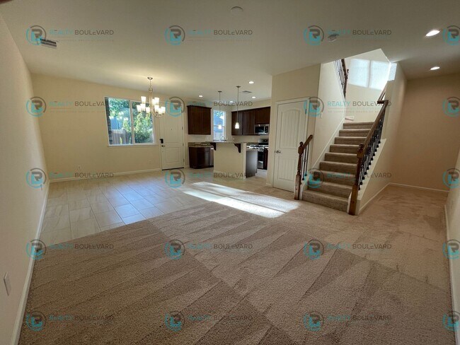Building Photo - Luxury and Convenience Fully Equipped 3-Bedroom 2.5 Bathroom 2 Car Garage Townhome in Carson City