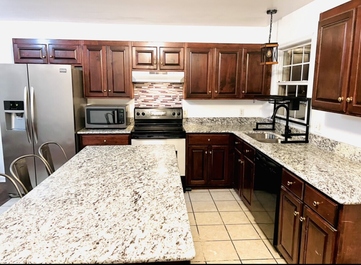 light filled kitchen area - 5328 Smiley Hollow Rd