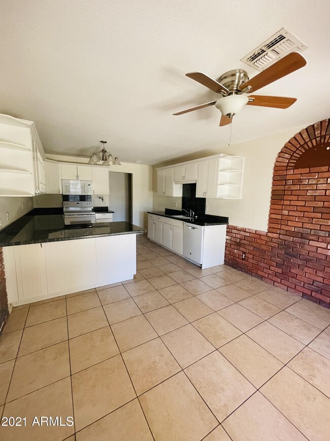 Building Photo - 10642 E Arbor Ave