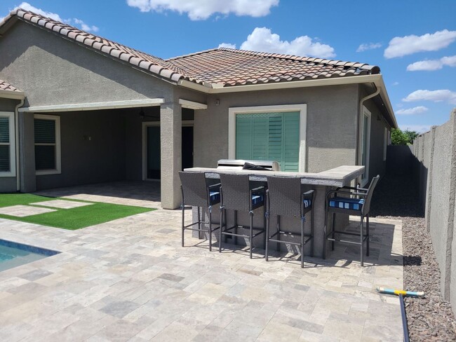 Building Photo - Pristine Luxury Rental: Stunning 4-Bed, 2....