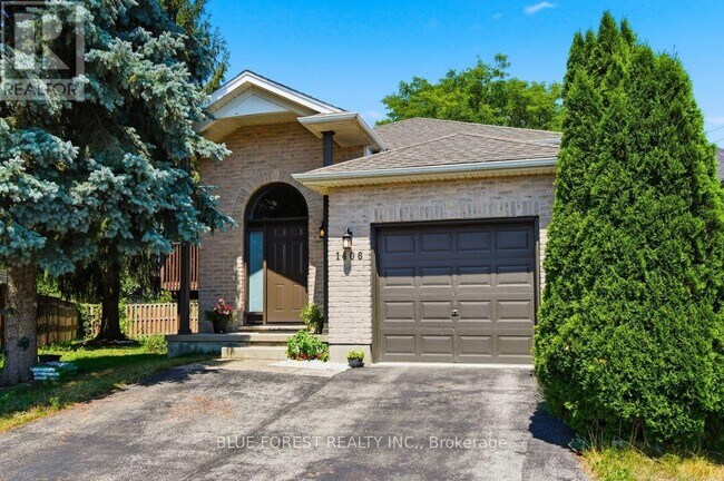 Photo du bâtiment - 1406 Aspenridge Crescent