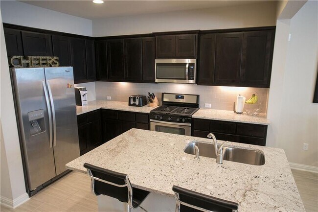 Foto del edificio - 6814 E Riverside Dr