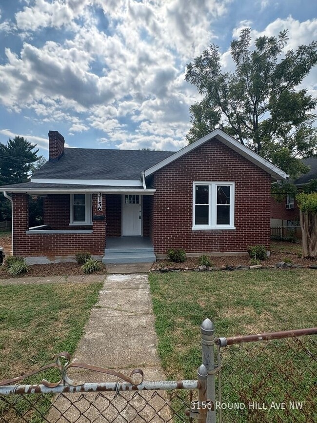 Building Photo - 3156 Roundhill Ave NW