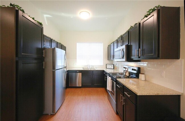 Building Photo - 2400 Louis Henna Blvd