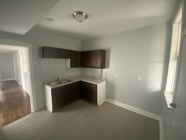 Building Photo - 6627 S Vernon Ave