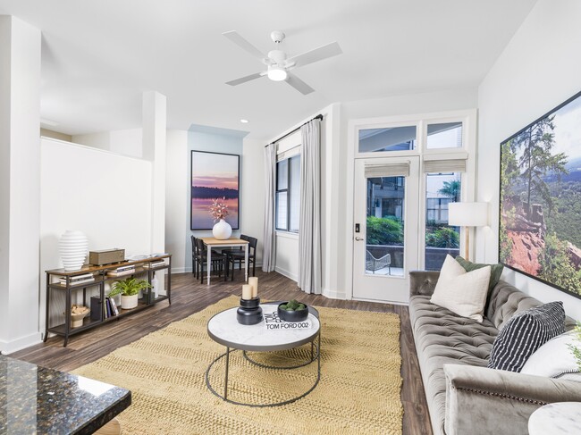 Wood plank-style flooring throughout main living areas. - Alister Uptown