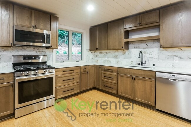 Building Photo - Modern 2-Bedroom Gem with Garage, Shed, an...
