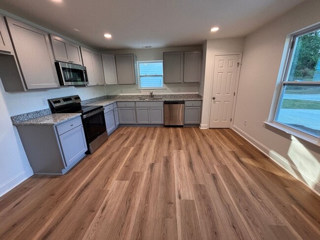 Building Photo - 3 Bedrooms, 2 Bathrooms - NEW CONSTRUCTION...