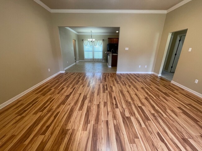 Building Photo - House: Driftwood Estates (Available after ...