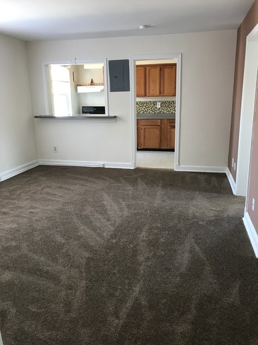 Living Room facing Bar - Hillcrest Village Apartments