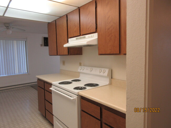 kitchen with range - 2210 N Houk Rd