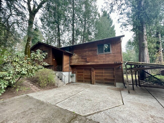 Building Photo - Nestled in the Trees 3 Bed 2.5 Bath in Lak...