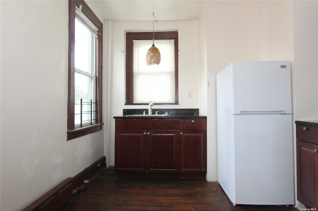 Building Photo - 18-06 120th St