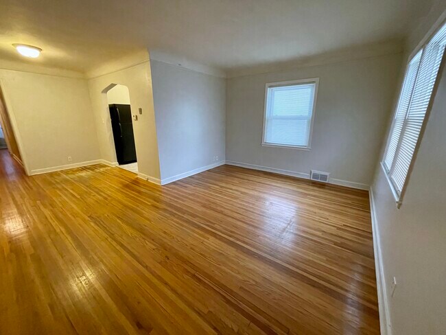 Main level living room and dining room. - 5515 Nicollet Ave