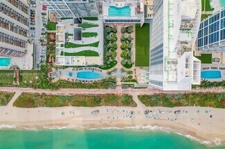 Building Photo - 6899 Collins Ave