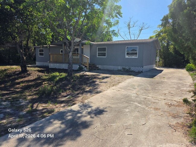 Building Photo - 4180 Royal Palm Ave