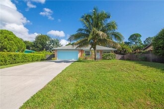 Building Photo - 7402 Coquina Ave