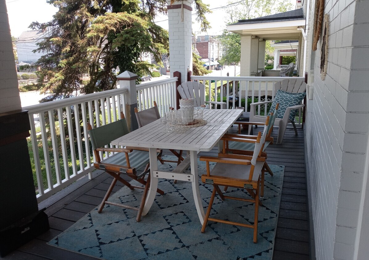Front porch Hyde Park Square beyond. - 3549 Edwards Rd