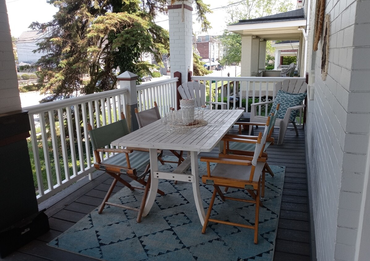 Front porch Hyde Park Square beyond. - 3549 Edwards Rd