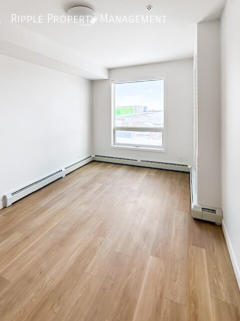 Photo du bâtiment - MODERN 1-BED CONDO | BELVEDERE PREMIER LIVING | SLEEK FINISHES