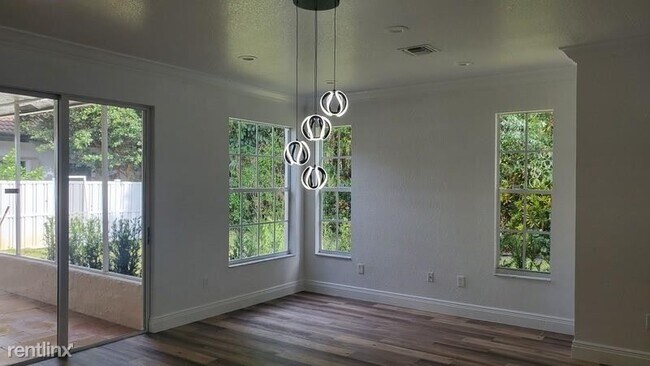 Foto del edificio - 4 br, 3 bath House - 5176 NW 50th Ter