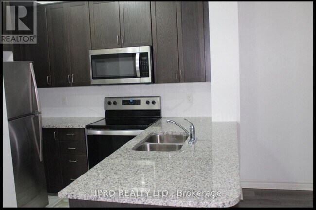 Building Photo - 349-349 Rathburn Rd W