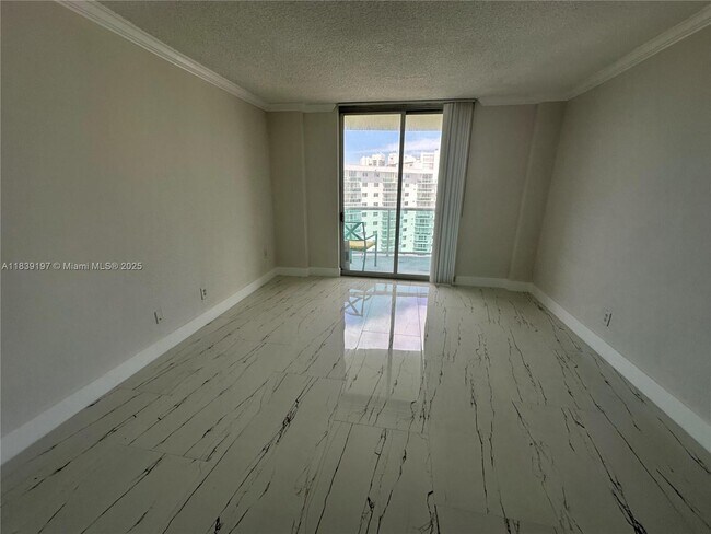 Building Photo - 19390 Collins Ave