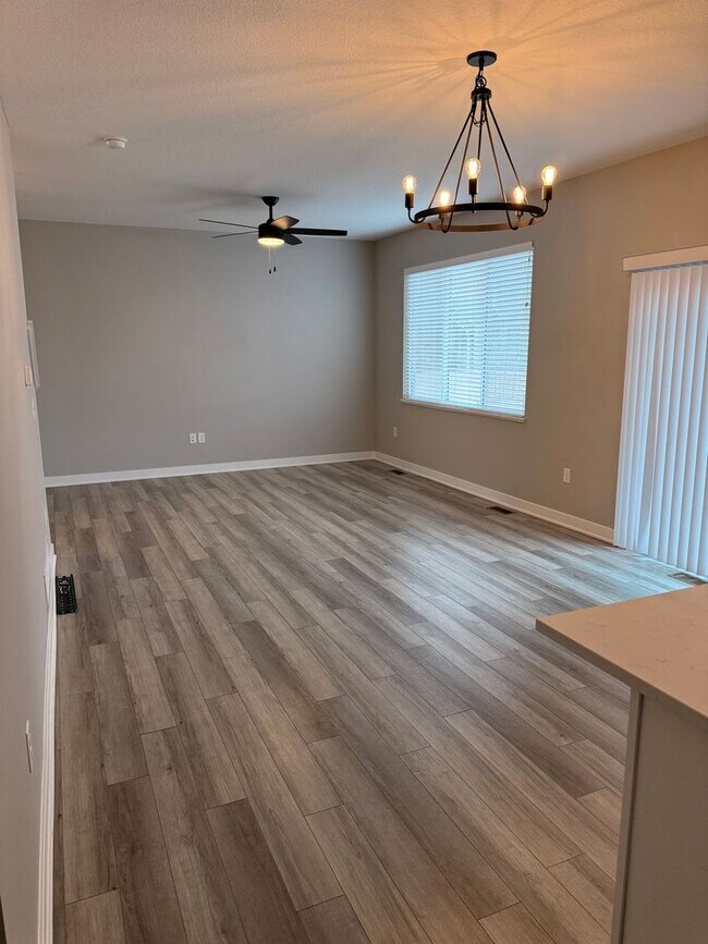 Building Photo - Spacious 4-Bedroom Home with 2-Car Garage & Yard