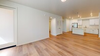 Located at 3644 Harrison St in Riverside, CA, this single-floor, 3-bedroom, 2-bathroom unit offers a clean, modern design with a bright and neutral color palette throughout. Light wood-style flooring flows seamlessly across every room, creating a cohesive and airy feel.

The open-concept living area connects directly to a well-appointed kitchen, which features white shaker cabinetry with brushed nickel hardware, light quartz countertops, a center island, recessed lighting, and a full suite of stainless steel appliances including a refrigerator with ice maker, range, microwave, and dishwasher.

The three bedrooms are comfortably sized, with the primary bedroom offering its own dedicated space and closet access. The secondary bedrooms receive generous natural light through sizable windows fitted with blinds, with outdoor views of the surrounding neighborhood. Two hallways and two closets provide practical storage and circulation throughout the unit.

Both bathrooms are finished in a clean, contemporary style with white surrounds, soaking tub-shower combinations, light countertops, and white cabinetry. One bathroom includes built-in open shelving for added storage convenience. The overall ambiance of the unit is bright, functional, and move-in ready.