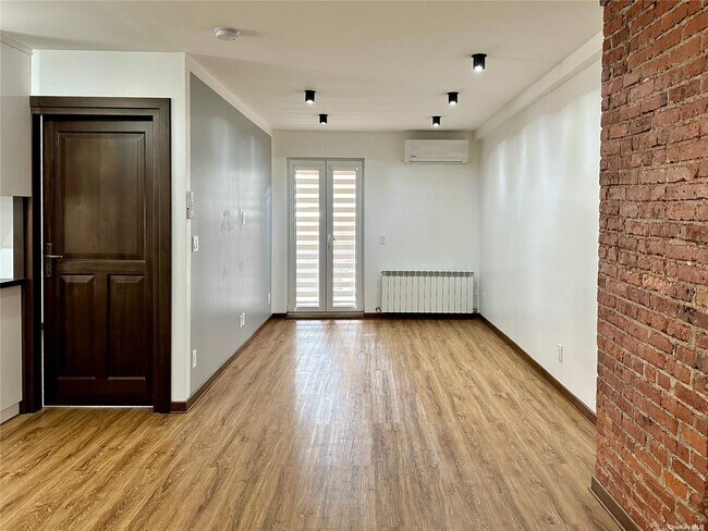 Building Photo - 72-36 66th Dr