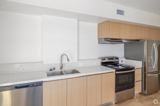 3 habitaciones, 2 baños - 1290 pies cuadrados - Cocina - Woodlake Apartments