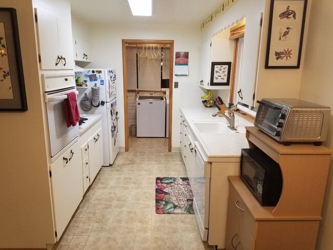 Kitchen with laundry room in the back - 1415 9th Ave SW