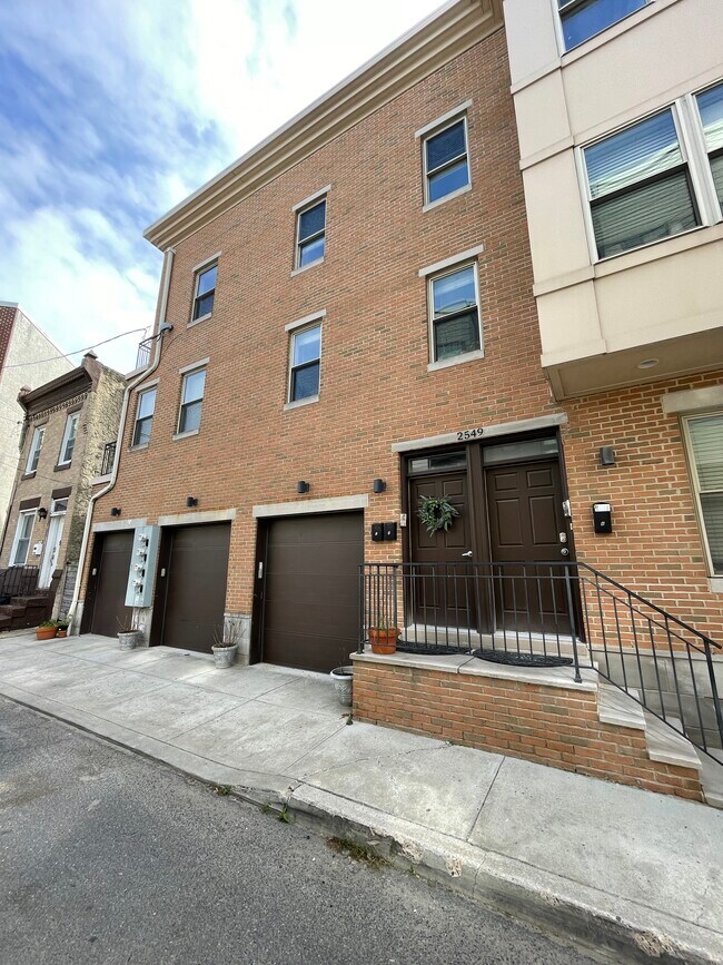 Front of Building. Garage is on far left. - 2549 Grays Ferry Ave