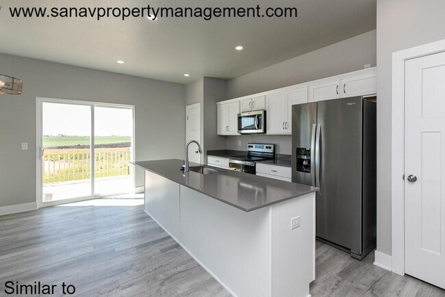 Building Photo - Stunning 4-Bedroom Home with Finished Base...
