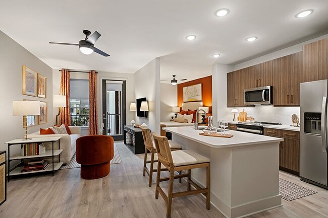 Expansive studio, one-, two-, and three-bedroom apartments and townhomes - Auden Apartments