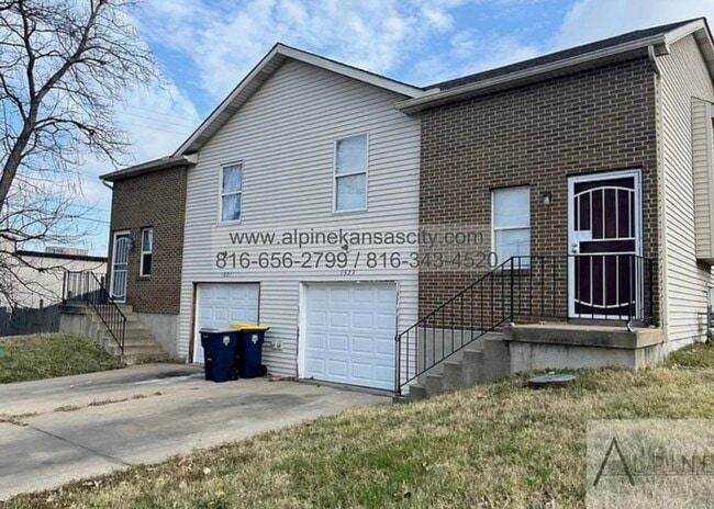 Building Photo - NE 4 Bedroom Duplex, Garage, Vouchers OK