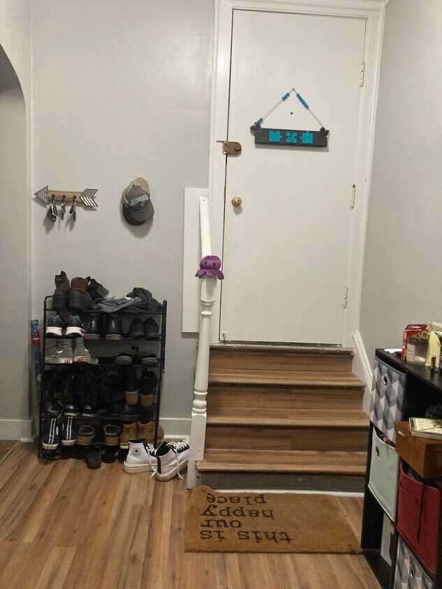 This a garden level apartment, so its just a few steps down to enter. - 2134 W Arthur Ave