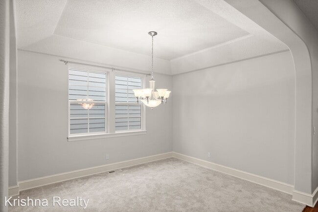 Building Photo - 4 br, 2.5 bath House - 4614 NW Oxbridge Dr