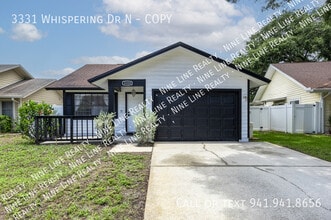 Building Photo - 3331 Whispering Dr N