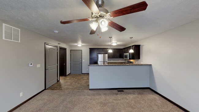Kitchen / Living Room - Village at Three Fountains