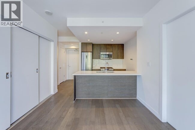 Building Photo - 9060 University Crescent