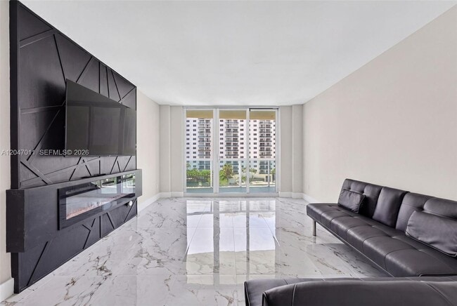Building Photo - 19380 Collins Ave