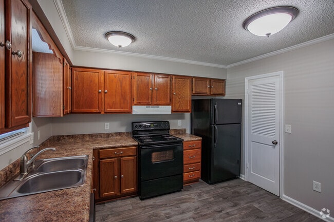 2BR, 1.5BA - 1100SF - Kitchen - Woodland Manor Condominiums