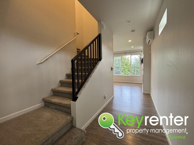 Building Photo - Stylish 4-Bedroom Home with Finished Basem...