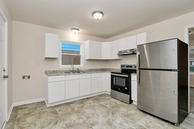 Foto del edificio - Updated 3 Bedroom Home with Modern Finishes