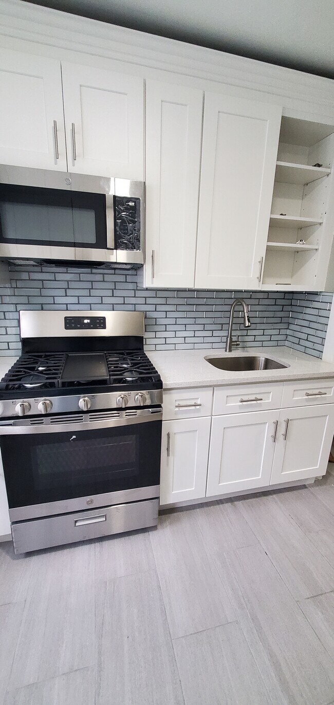 Brand New Fully Renovated Kitchen. Top of the line appliances. - 2649 91st St